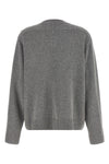 the nude knit redefines the elegance of knitwear through a bold material contras