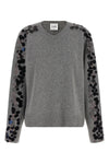 the nude knit redefines the elegance of knitwear through a bold material contras