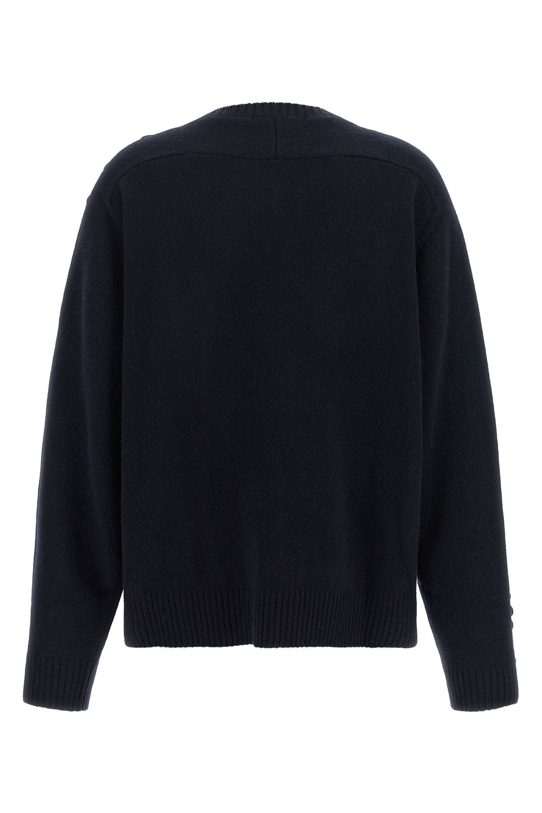 NUDE M the nude knit redefines contemporary knitwear through a bold material contrast