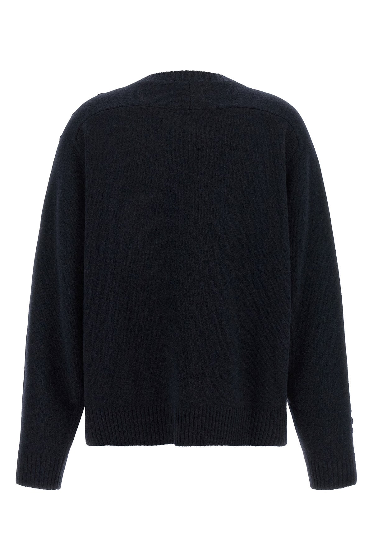 the nude knit redefines contemporary knitwear through a bold material contrast