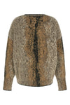 the nude crew neck sweater is distinguished by an oversized silhouette