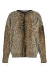 the nude crew neck sweater is distinguished by an oversized silhouette