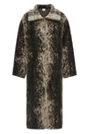 the nude coat redefines the volumes of contemporary outerwear through a straight