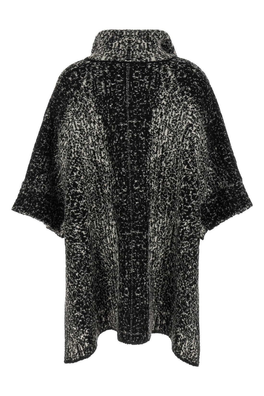 NUDE S the nude knit coat redefines the volumes of contemporary outerwear through a cap