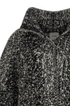 the nude knit coat redefines the volumes of contemporary outerwear through a cap