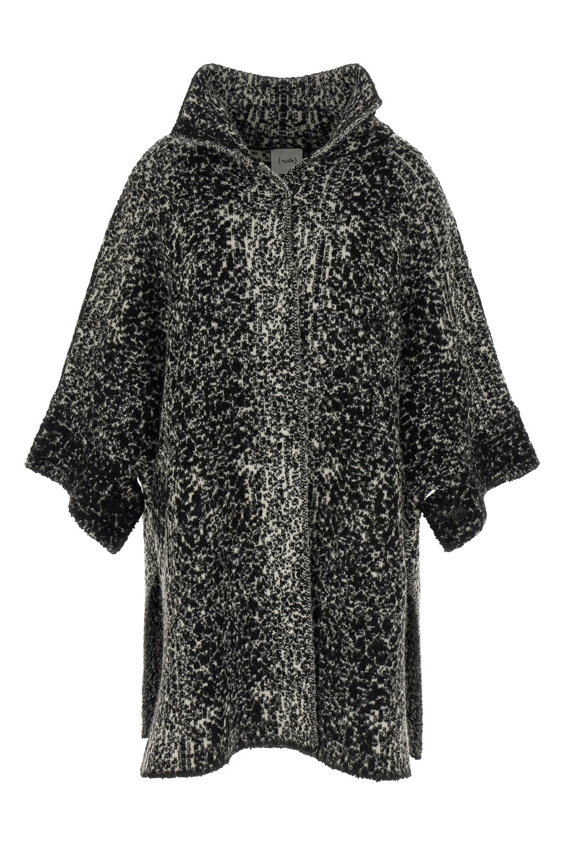 NUDE S the nude knit coat redefines the volumes of contemporary outerwear through a cap