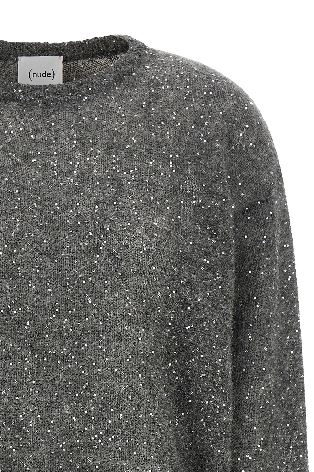 the sweater (nude) is made of a fine mohair and wool blend