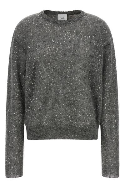 the sweater (nude) is made of a fine mohair and wool blend