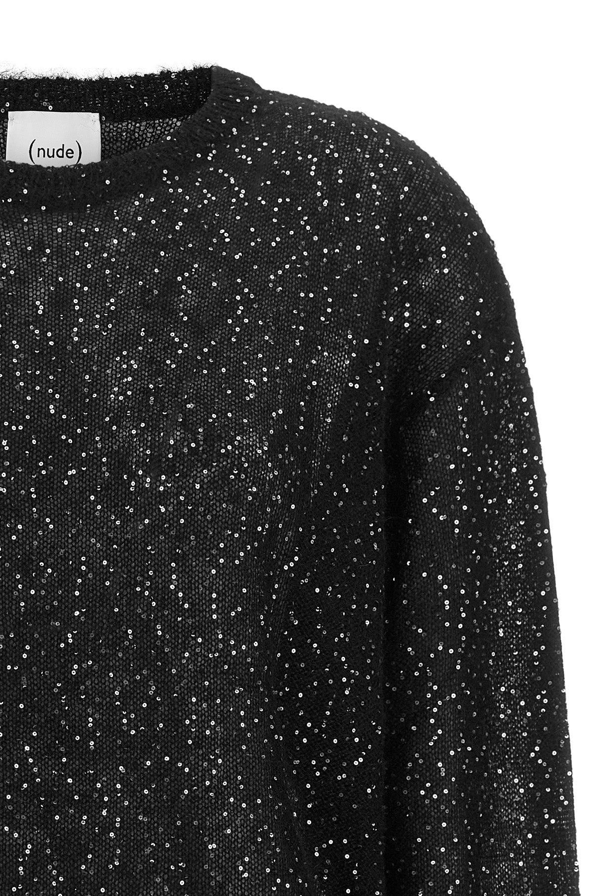 the sweater (nude) defines a sophisticated aesthetic through a construction in f