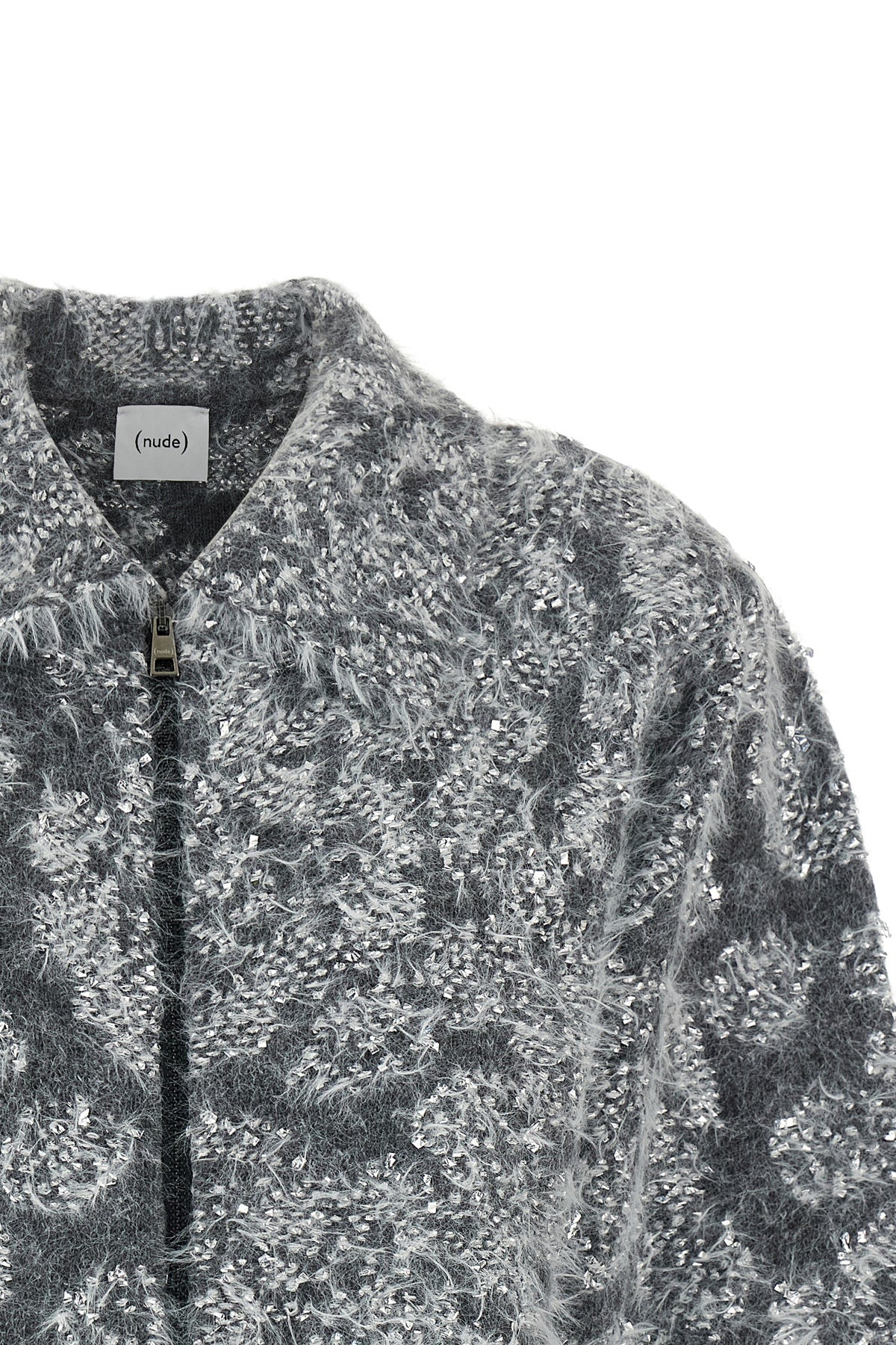 the nude cardigan is distinguished by a knit construction