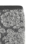 the midi skirt nude redefines knitwear through a straight and enveloping silhoue