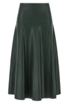 the nude midi skirt redefines the codes of contemporary elegance through a flare