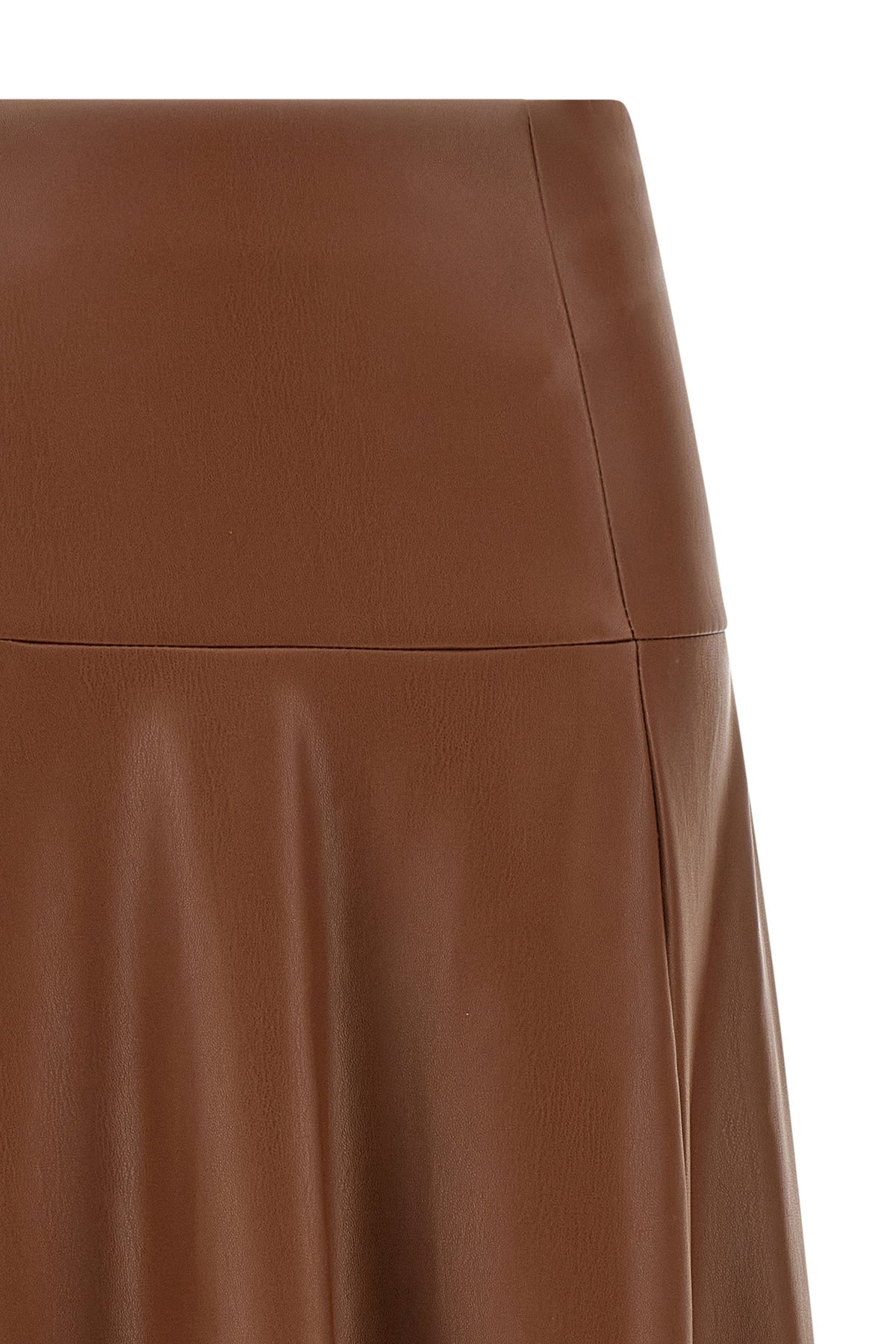 the midi skirt nude redefines the volumes of the contemporary wardrobe through a