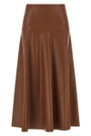 the midi skirt nude redefines the volumes of the contemporary wardrobe through a
