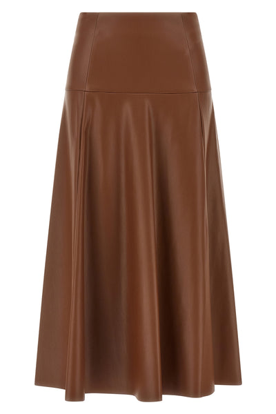 the midi skirt nude redefines the volumes of the contemporary wardrobe through a