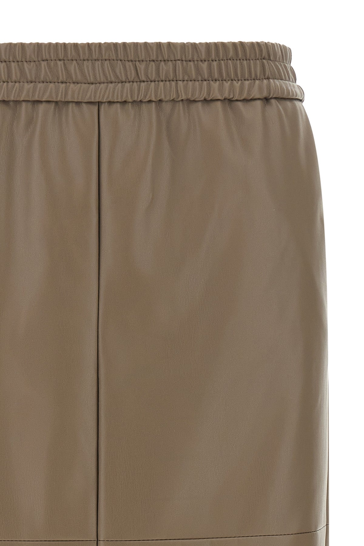 the midi skirt nude redefines the codes of everyday wardrobe through an essentia