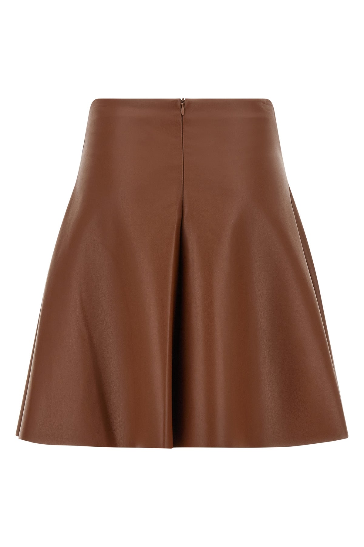 the nude mini skirt defines a flared silhouette