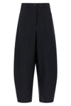 the nude trousers redefine the volumes of the daily wardrobe through a barrel-sh