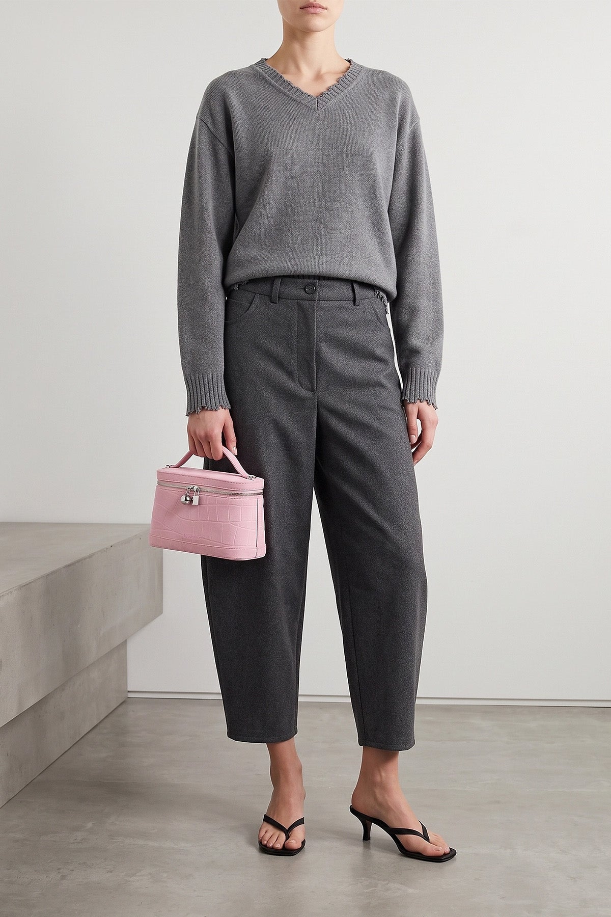 the nude trousers redefine the sartorial volumes through a distinctive barrel si