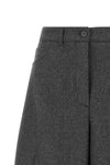 the nude trousers redefine the sartorial volumes through a distinctive barrel si