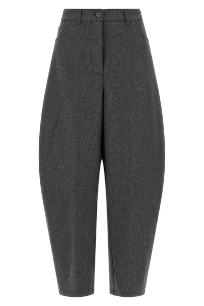 the nude trousers redefine the sartorial volumes through a distinctive barrel si