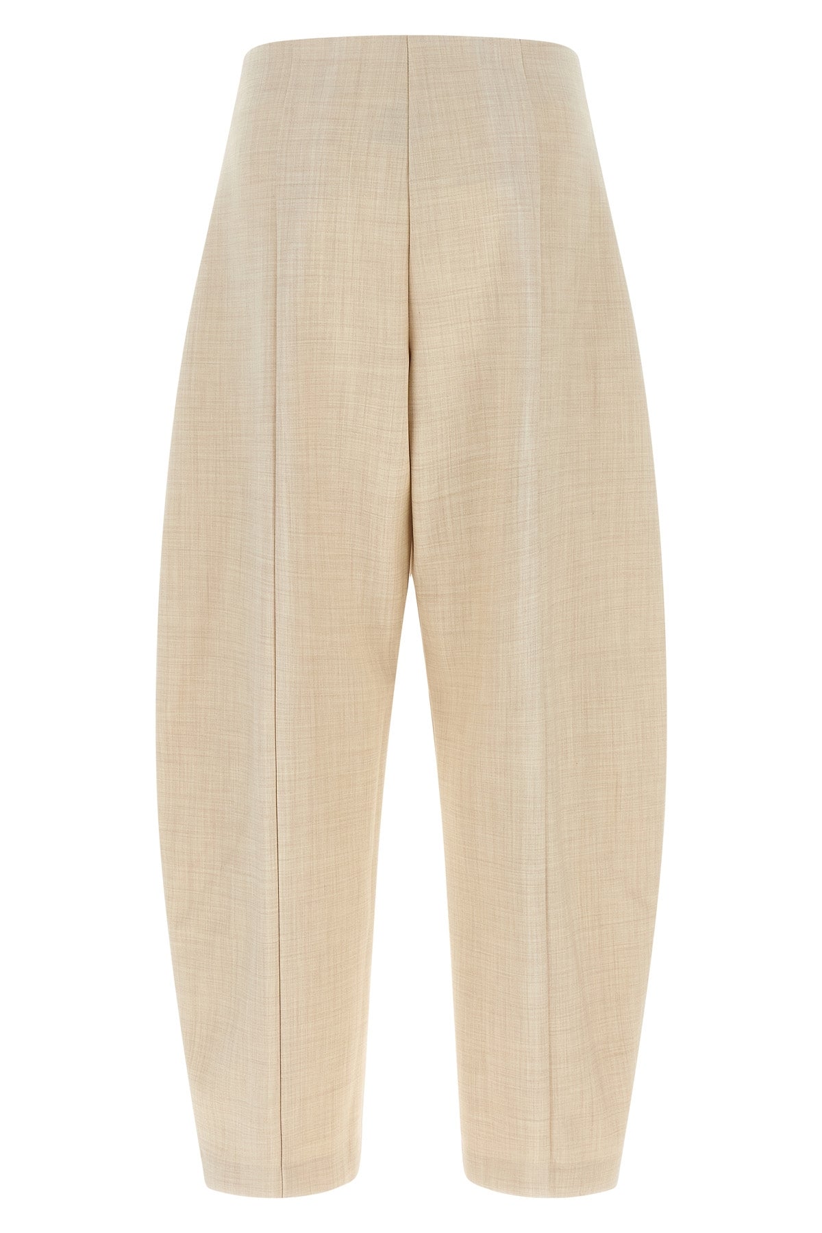 nude trousers redefine sartorial volumes through a distinctive balloon silhouett