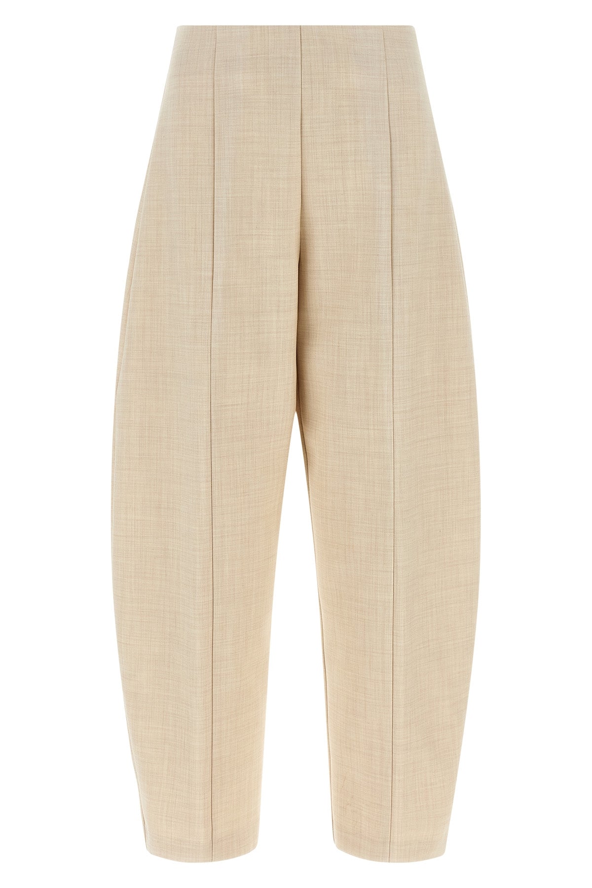 nude trousers redefine sartorial volumes through a distinctive balloon silhouett