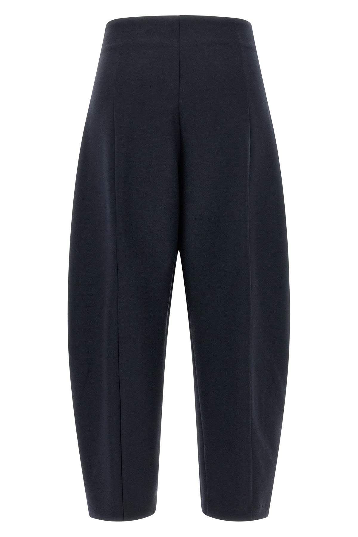 the nude pants define new volumes through a rigorous sartorial construction