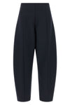 the nude pants define new volumes through a rigorous sartorial construction