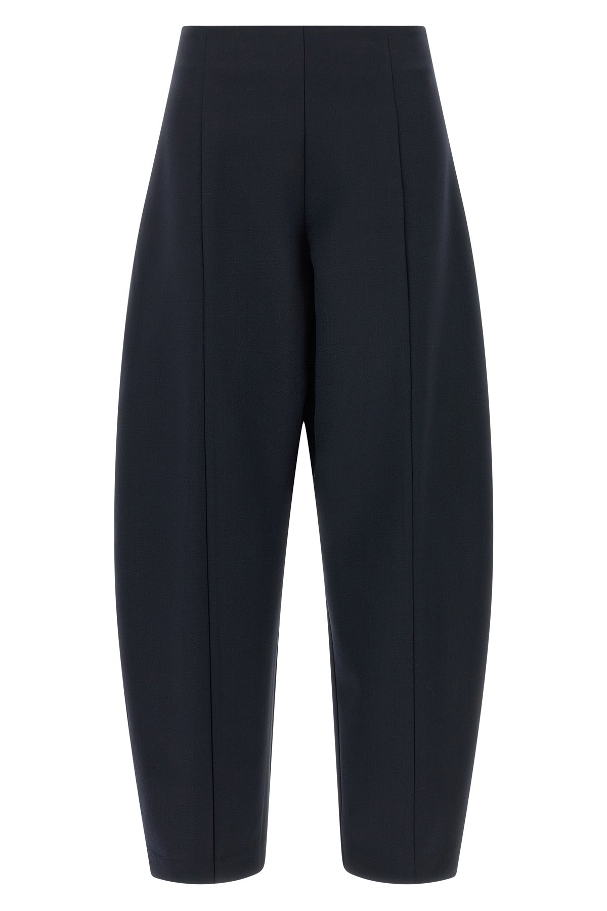 the nude pants define new volumes through a rigorous sartorial construction