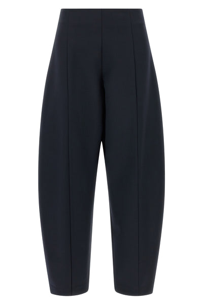 the nude pants define new volumes through a rigorous sartorial construction