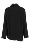 the nude blouse is distinguished by a sartorial construction focused on volume a