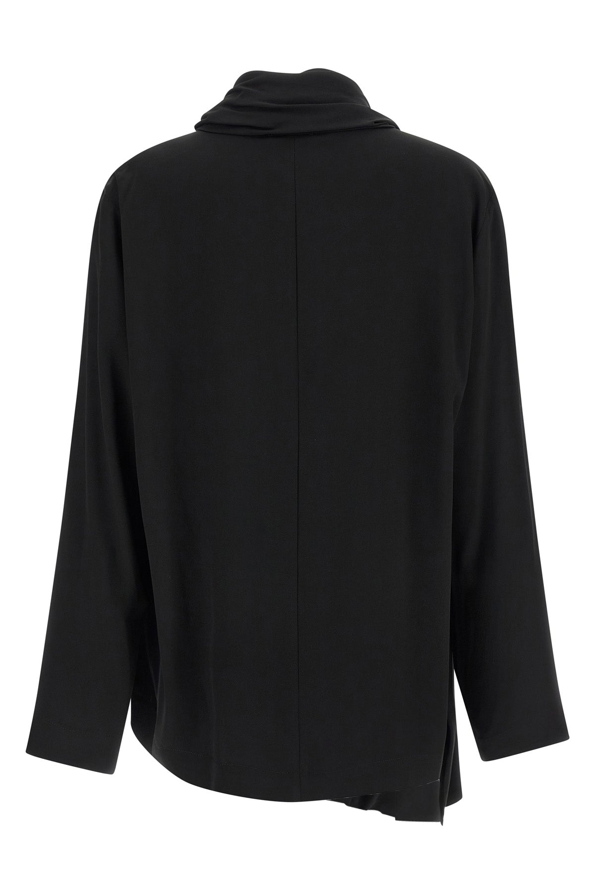 the nude blouse is distinguished by a sartorial construction focused on volume a