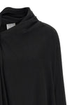 the nude blouse is distinguished by a sartorial construction focused on volume a