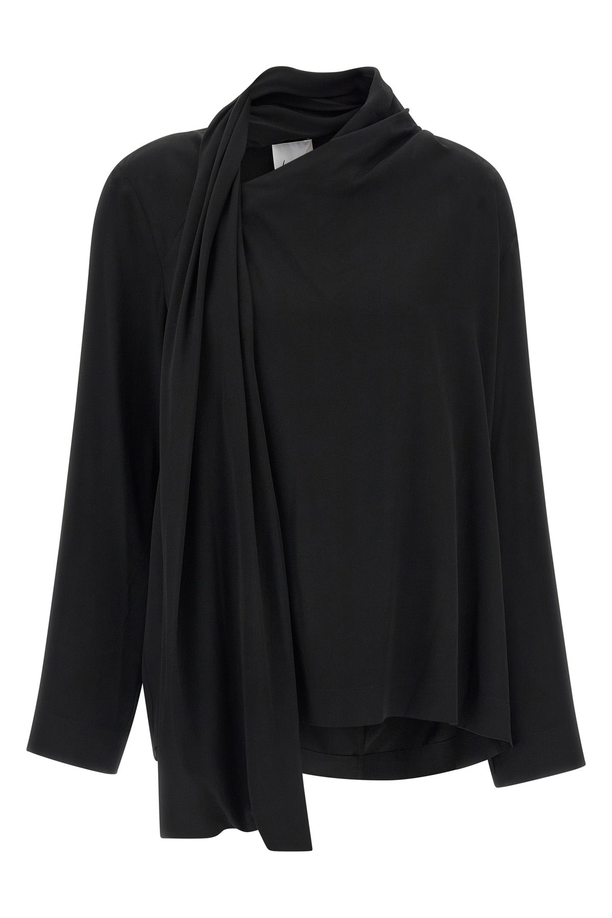 the nude blouse is distinguished by a sartorial construction focused on volume a
