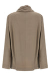 the nude blouse is distinguished by a fluid silhouette and an asymmetrical desig