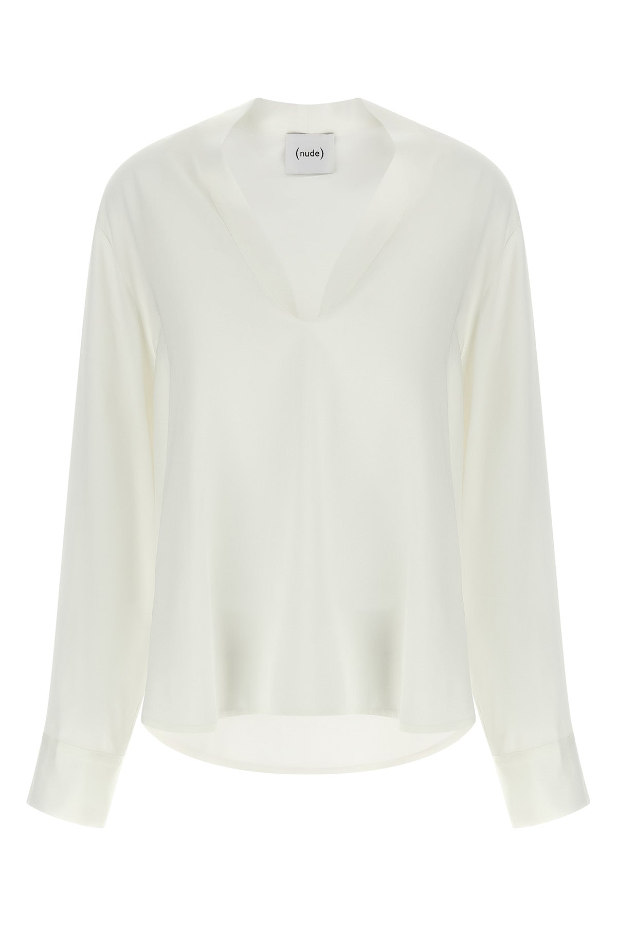 the nude blouse is distinguished by a fluid and deconstructed silhouette