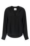 (nudes) long-sleeved blouse redefines minimalist elegance through a fluid silho