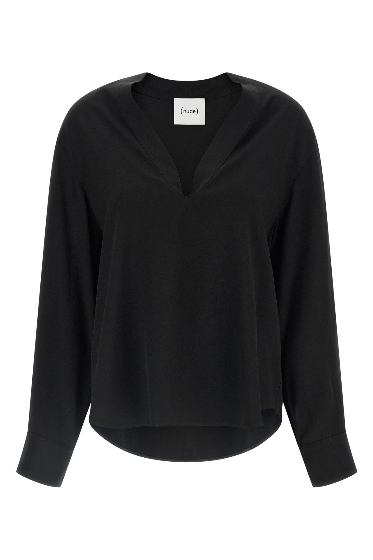 (nudes) long-sleeved blouse redefines minimalist elegance through a fluid silho