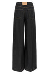 nude tilda jeans define a rigorous silhouette through large and structured vol