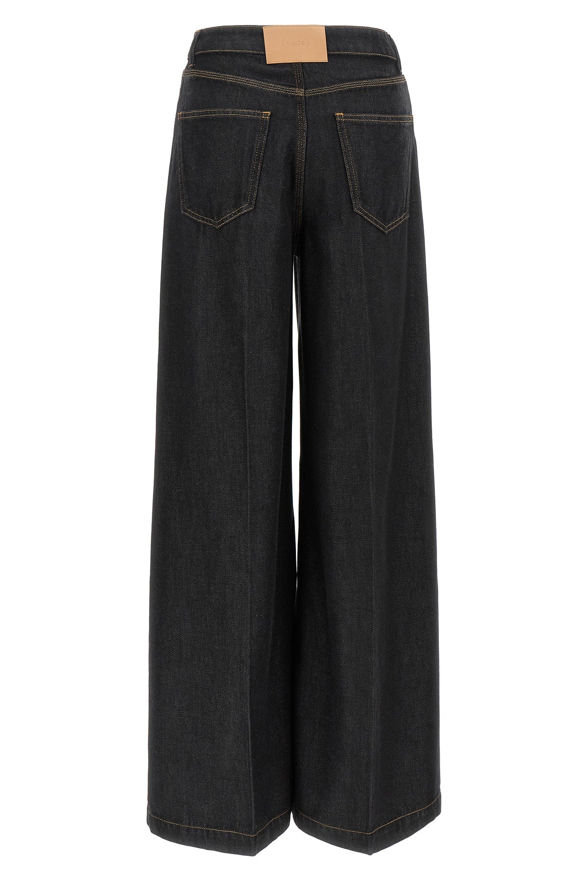 nude tilda jeans define a rigorous silhouette through large and structured vol