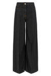 nude tilda jeans define a rigorous silhouette through large and structured vol