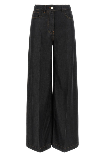 nude tilda jeans define a rigorous silhouette through large and structured vol