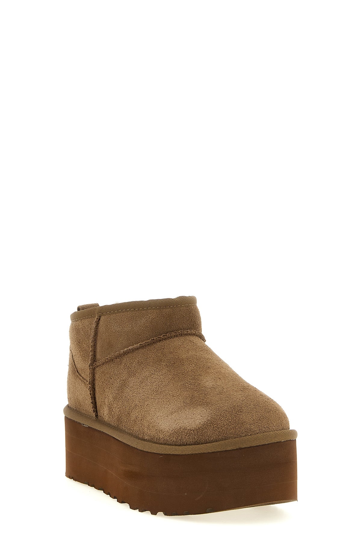 the ugg ankle boots redefine the brands iconic silhouette through bold proporti