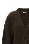 the rotate birger christensen peplum cardigan defines a sculptural silhouette th