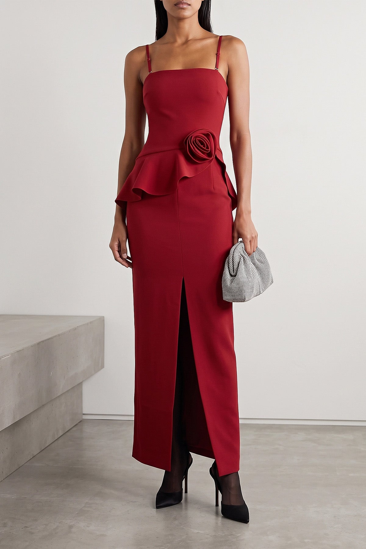 the long dress rotate birger christensen defines a tight and sculptural silhouet