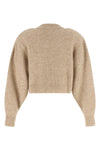 the cardigan rotate birger christensen redefines contemporary knitwear through a