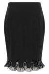 the rotate birger christensen midi skirt redefines the codes of evening elegance
