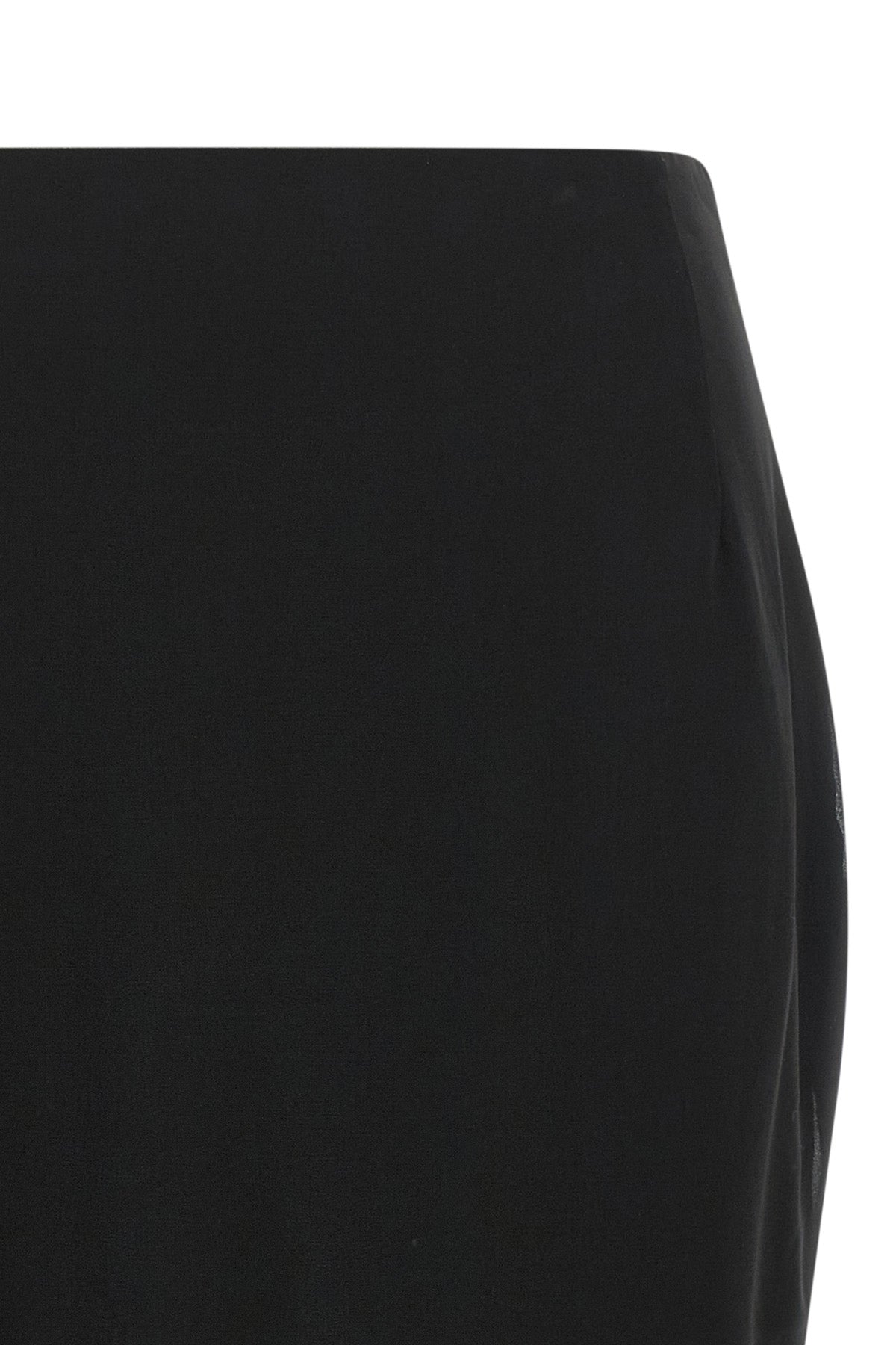 the rotate birger christensen midi skirt redefines the codes of evening elegance