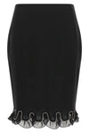the rotate birger christensen midi skirt redefines the codes of evening elegance